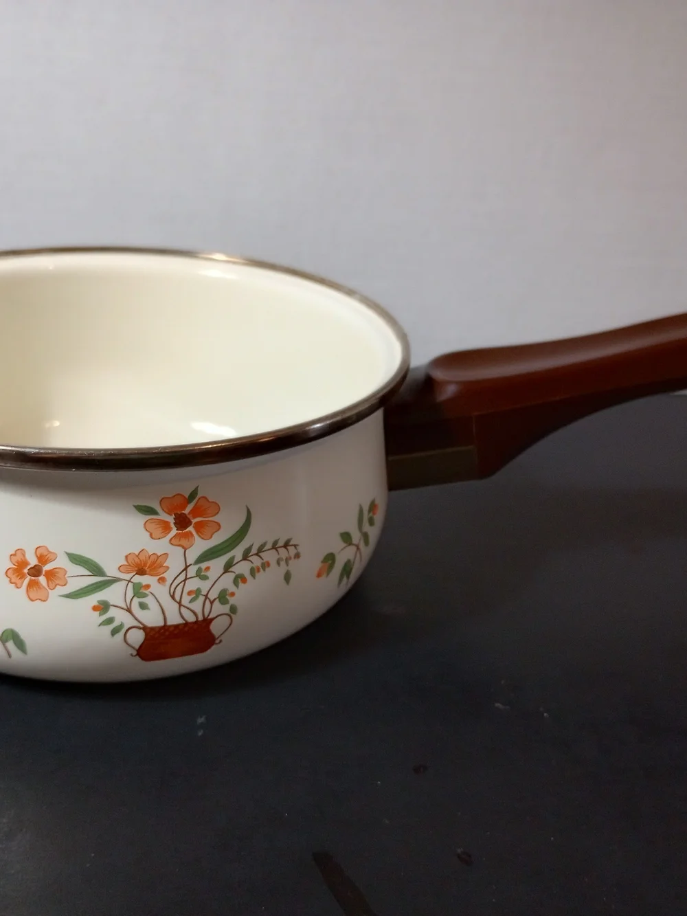 Cream Enamel Saucepan with Orange Floral Motif and Brown Handle